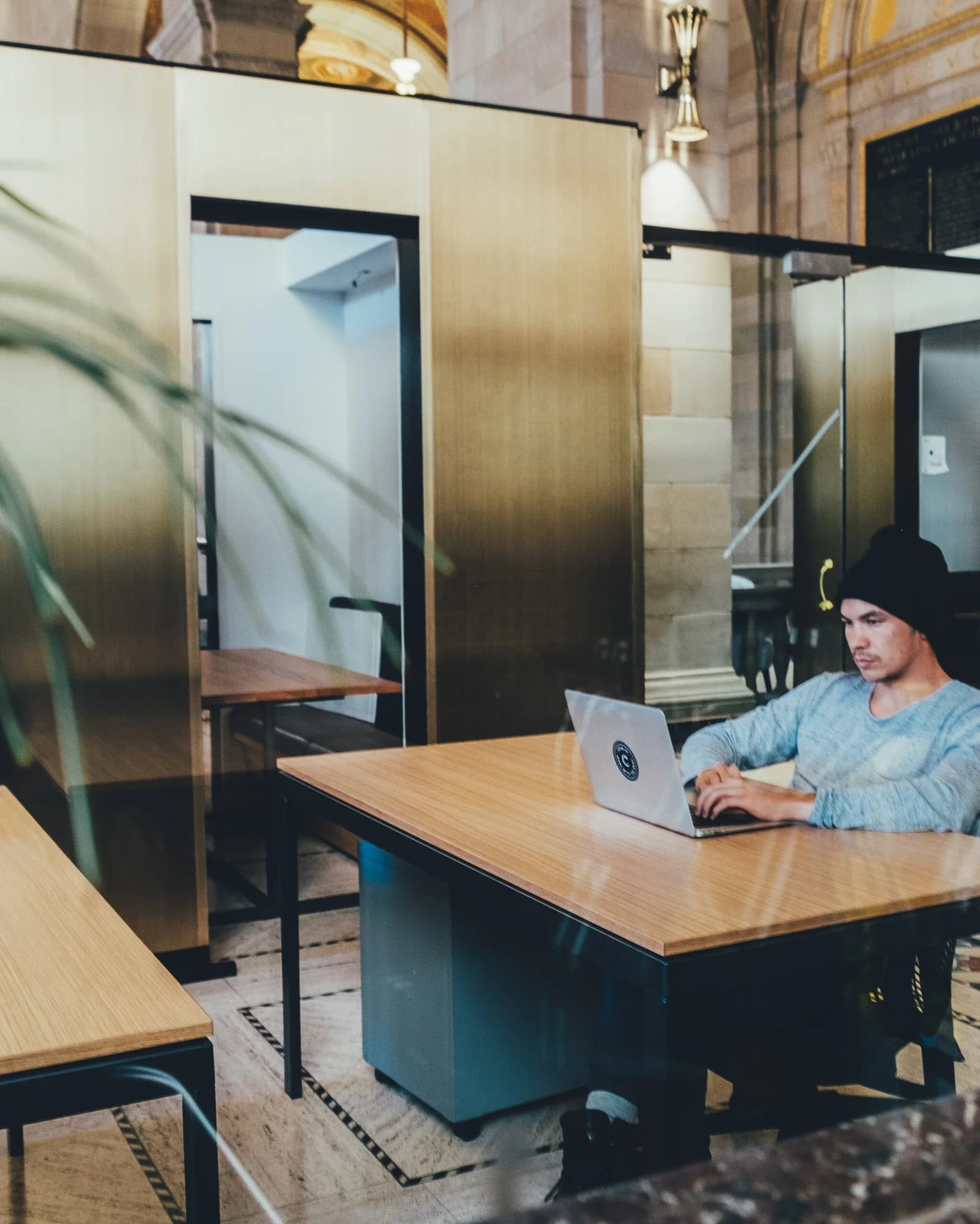 A team working at desks in an open office, screening inbound leads